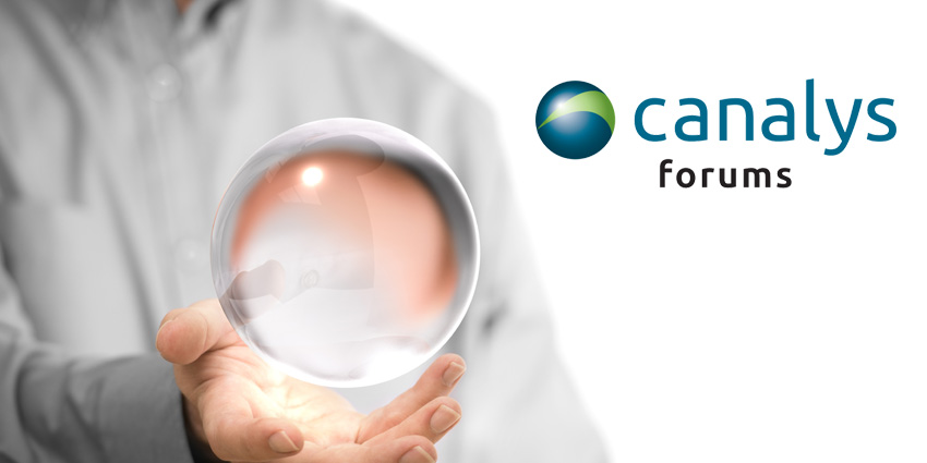 Man in grey suit out of foucs, holding a crystal ball that is in focus
