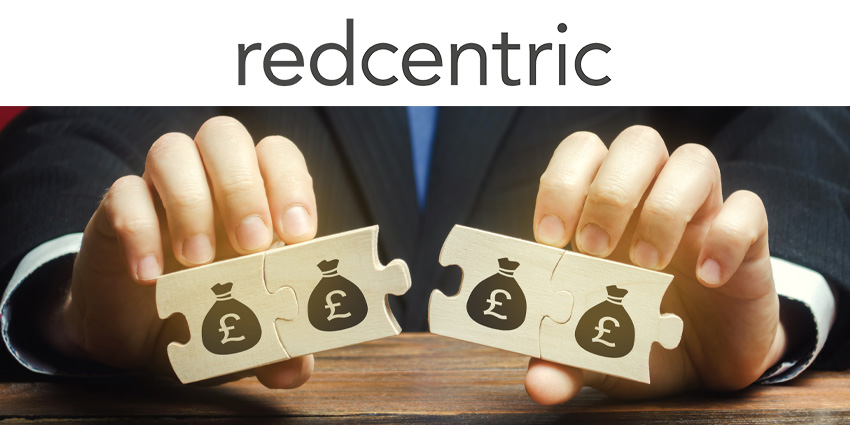 Man in business suit holding two wooden jigsaw pieces in each hand with pound symbols on each