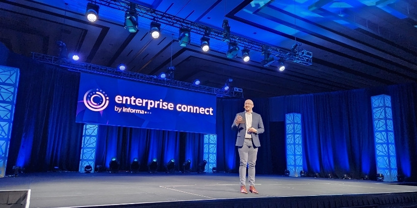 Enterprise Connect 2026 News - photo of Justin Robbins on stage